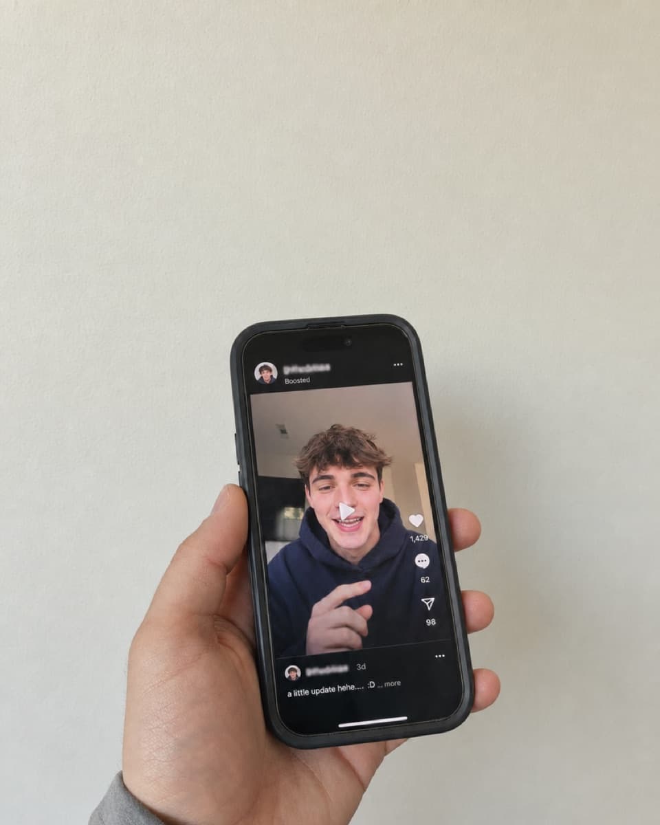 A phone showing the clip boosted from the creator’s own handle.