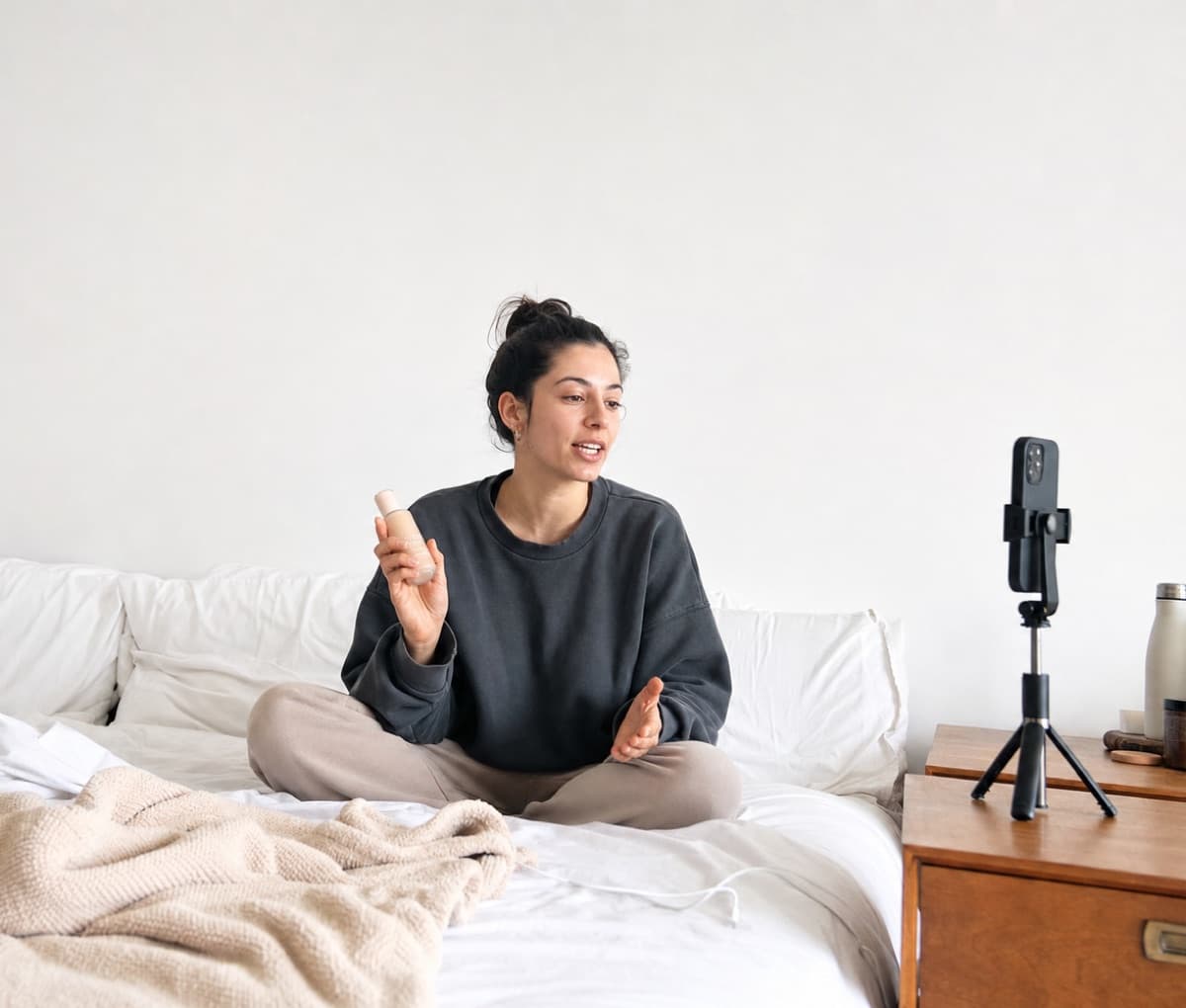 A creator recording a piece to camera at home.