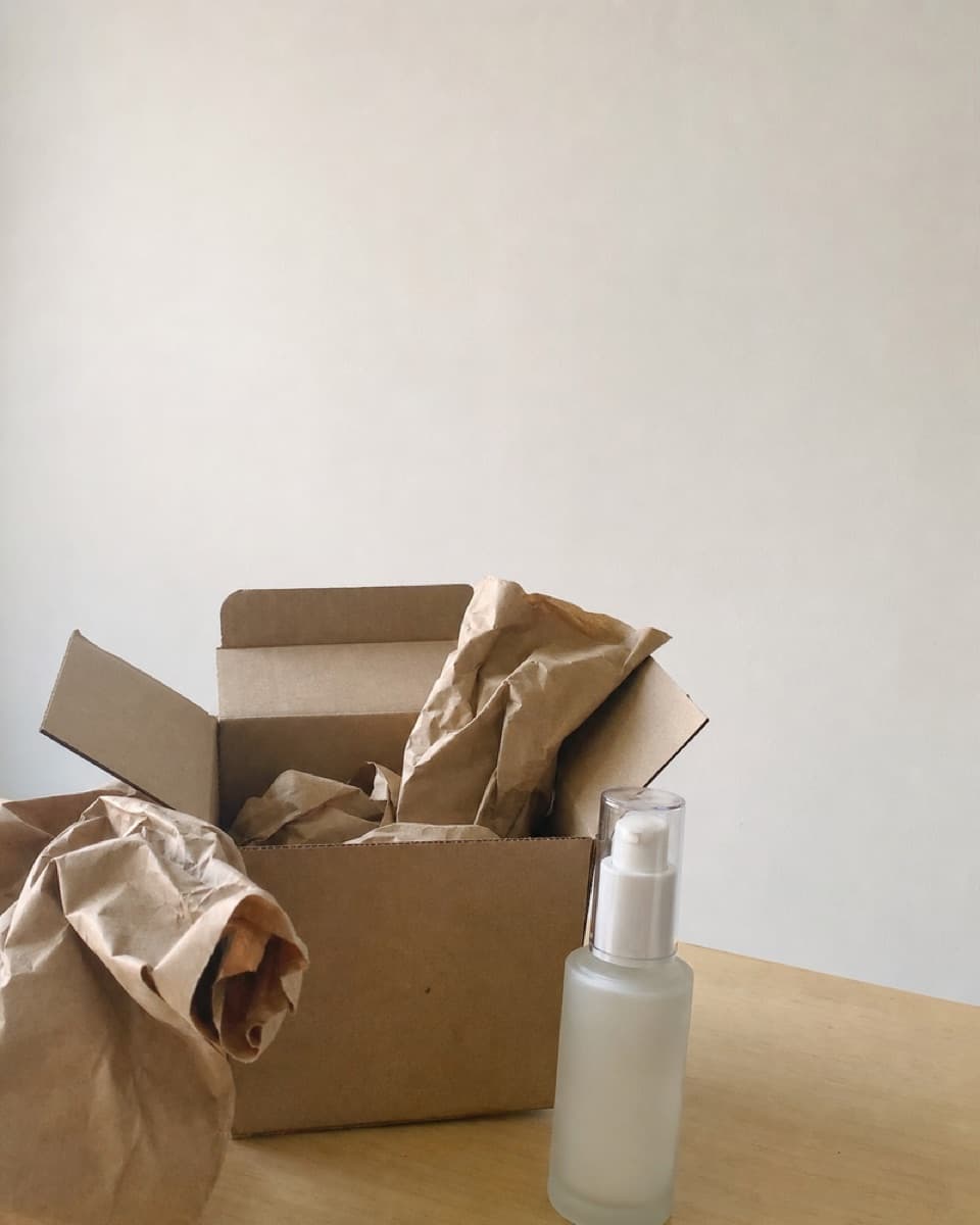 A product unboxed on a table beside its packaging.